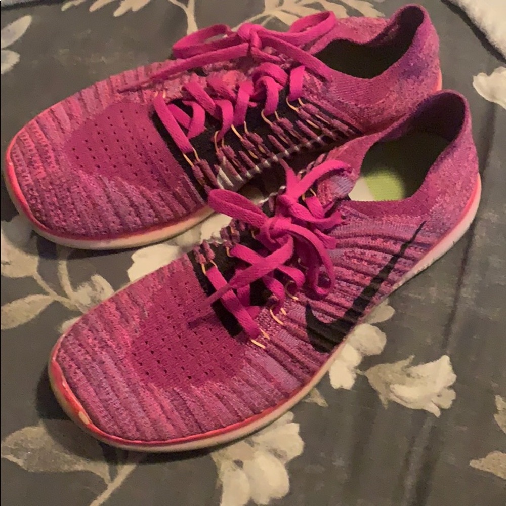 hot pink Nike tennis shoes